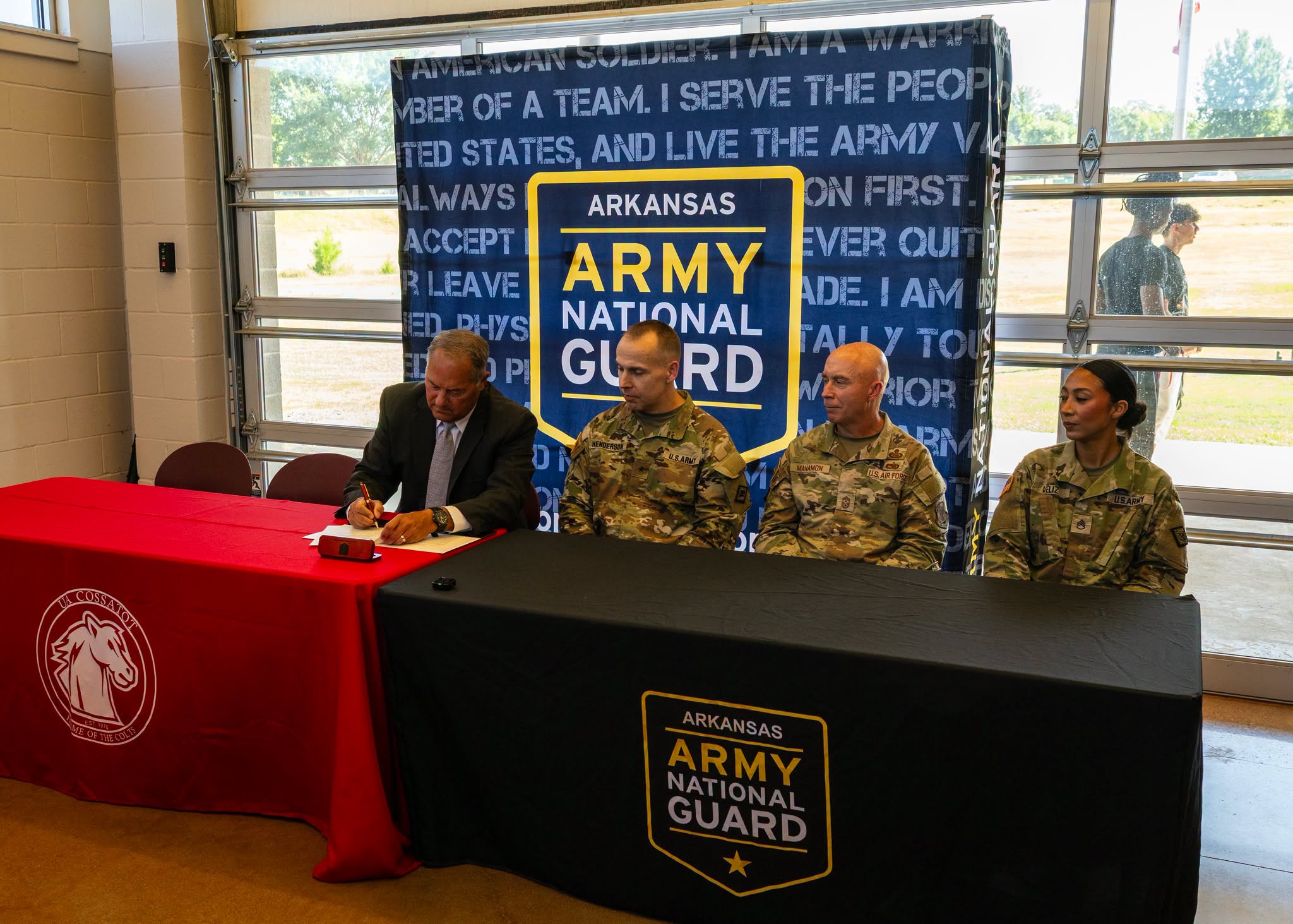 Chancellor Steve Cole signs Partnership with Arkansas Army National Guard
